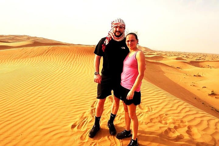 Morning Red Dunes Safari Dubai: Camel Trek, Dune Bashing & Sandboarding photo 2