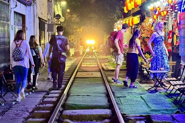 Hanoi Jeep Tour: Old Quarter, B‑52 Lake, Long Bien Bridge & Train Street Food Crawl photo 5