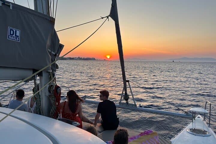Sunset Catamaran Cruise in Rhodes: Aegean Evening Sail with Drinks