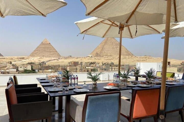 Half-Day Giza Pyramids & Sphinx: Camel & ATV Adventure with Rooftop Lunch photo 4