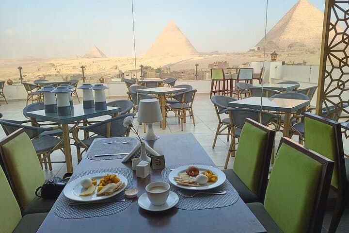 Half-Day Giza Pyramids & Sphinx: Camel & ATV Adventure with Rooftop Lunch photo 6
