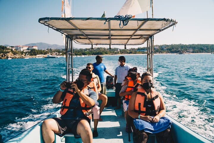 Puerto Escondido Day Trip from Oaxaca: Boat Tour, Surf & Turtle Release