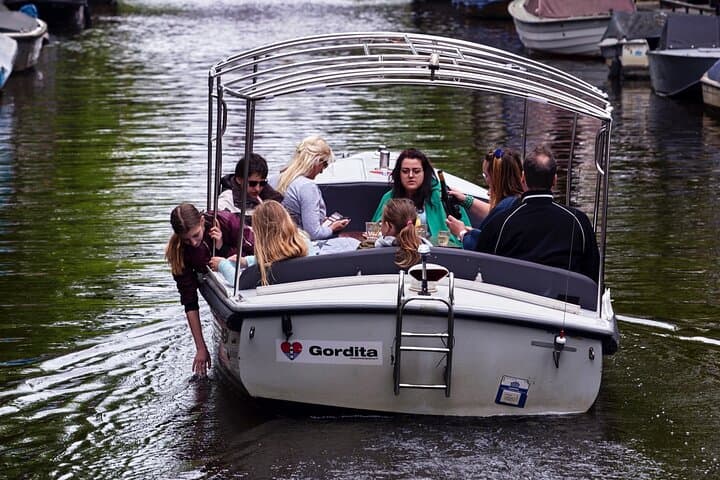 Private 90-Minute Amsterdam Canal Cruise with Live Guide & Drinks photo 6