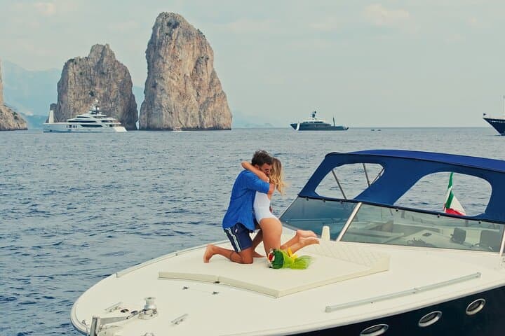 Capri Private Luxury Boat Tour — Faraglioni, Blue Grotto & Secret Coves photo 2