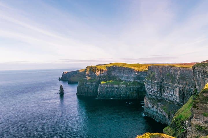 Cliffs of Moher, Bunratty Castle & Ennis Day Trip from Dublin — Guided Tour with Visitor Centre Entry photo 1