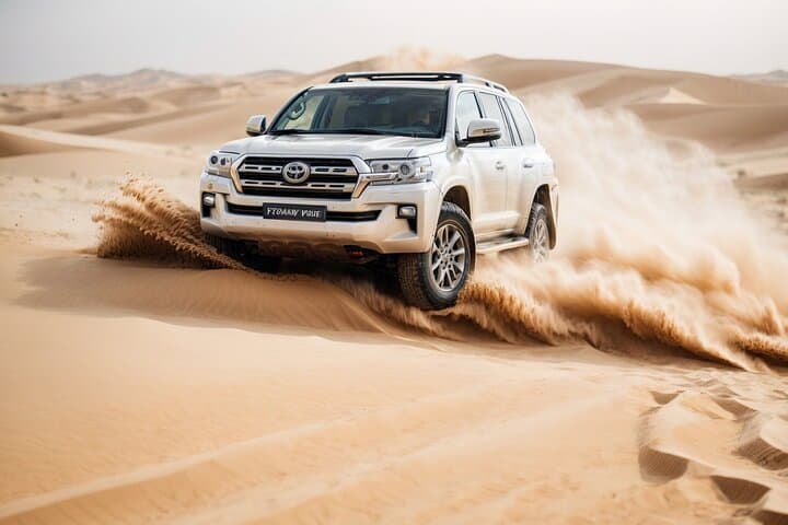 Evening Lahbab Desert Safari: Dune Bashing, Sandboarding & BBQ Under the Stars