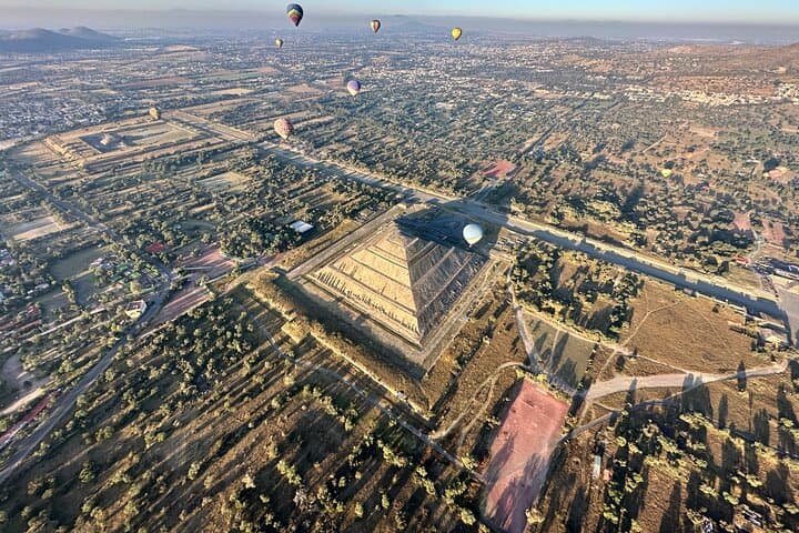 Sunrise Hot Air Balloon Over Teotihuacán — Flight, Cave Descent & Pyramid Walk