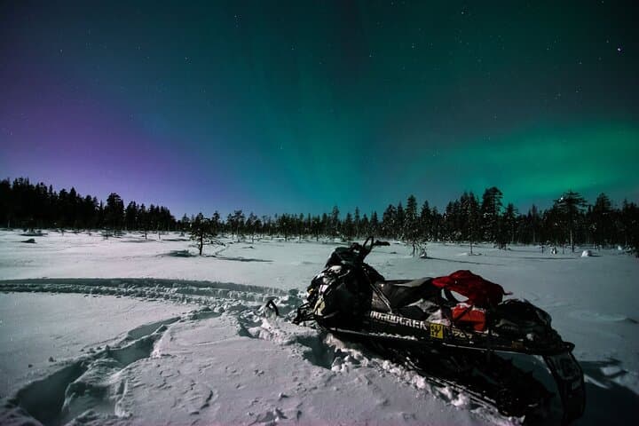 Evening Snowmobile Safari with Campfire in Saariselkä — Northern Lights Snowmobiling