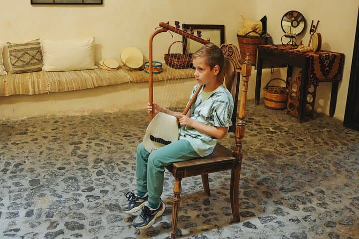 Santorini Family Cultural Day Tour: Oia, Akrotiri, Red Beach & Local Music photo 6