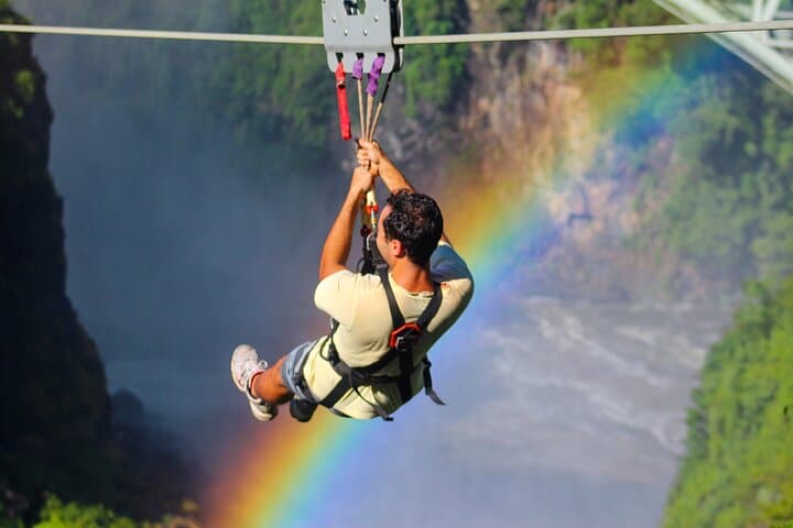 Experience the Thrill of the Victoria Falls Bridge Slide: The Longest Zipline Over Batoka Gorge photo 3