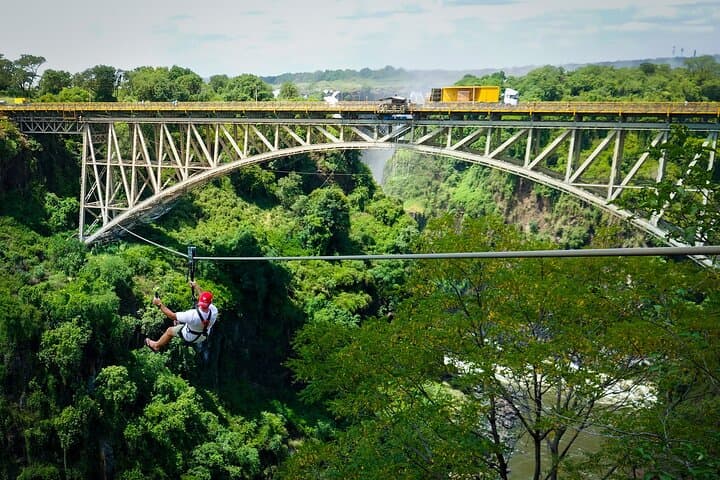 Experience the Thrill of the Victoria Falls Bridge Slide: The Longest Zipline Over Batoka Gorge photo 4