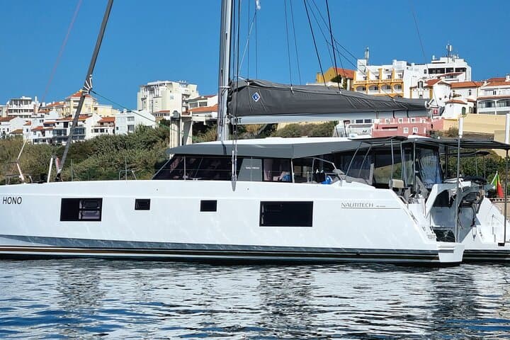 Private Half-Day Catamaran Cruise from Lagos: Caves, SUPs & Secluded Beaches photo 3