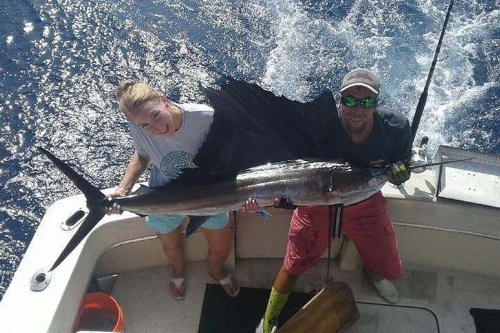 Key West Private Island & Fishing Charter on the 37ft Knotty Cowgirl photo 2