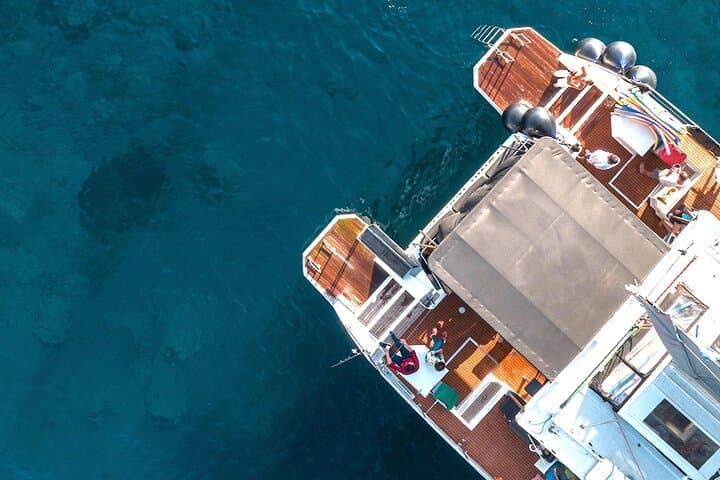 Santorini Caldera Catamaran Cruise with BBQ, Snorkeling & Open Bar photo 3