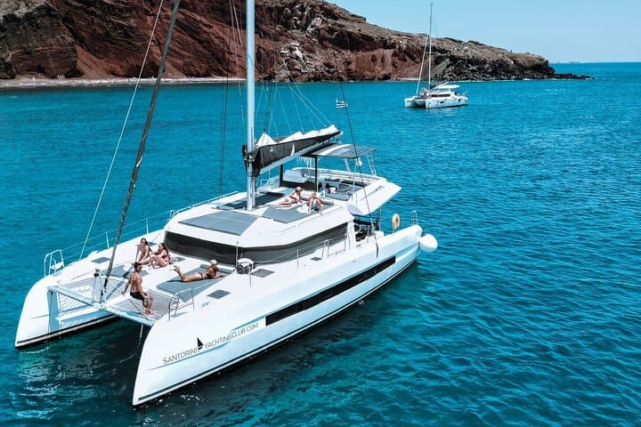 Santorini Caldera Catamaran Cruise to Hot Springs, Red & White Beaches photo 2