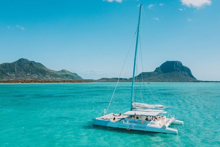 West Coast Mauritius Catamaran Cruise — Dolphins, Snorkel & Ile aux Bénitiers photo 1