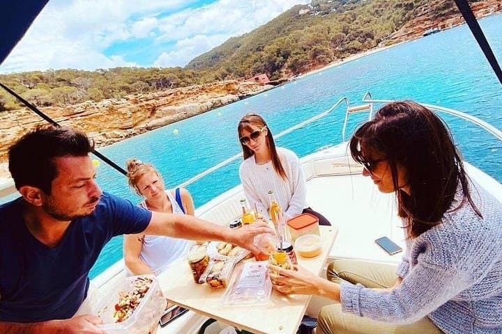 Private Boat Tour from Sant Antoni: Cala Bassa, Cala Conta & Cueva del Amor photo 4