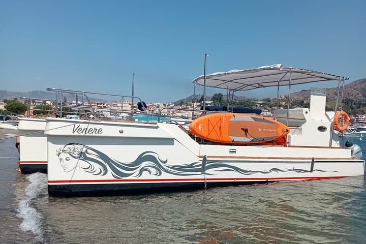 Taormina Dolphin Cruise: 2-Hour Boat Tour from Giardini Naxos photo 1