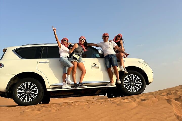 Dubai Desert Safari — Dune Bashing, Camel Ride & VIP BBQ Camp Experience photo 4