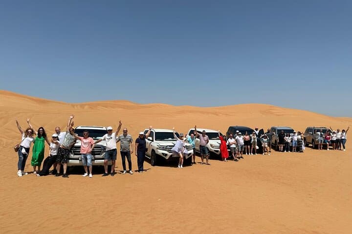 Abu Dhabi Desert Safari: 7-Hour Dune Bashing, Camel Ride & BBQ Experience