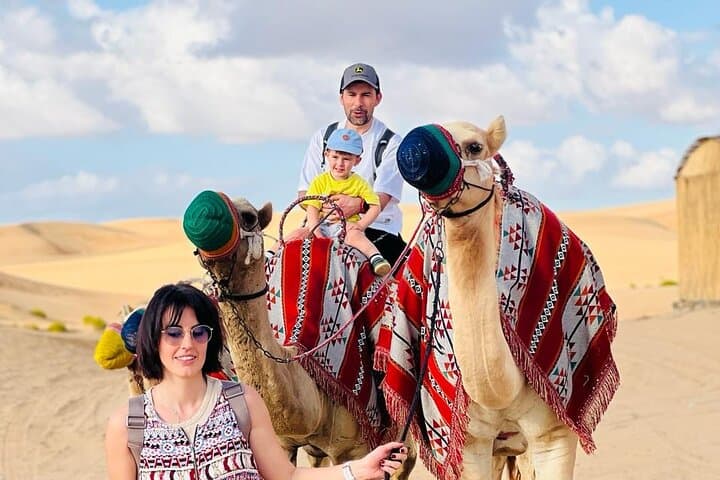 Abu Dhabi Desert Safari: 7-Hour Dune Bashing, Camel Ride & BBQ Experience photo 3