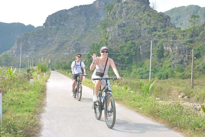 Mua Cave Tam Coc Hoa Lu Private Day Tour: Boat, Cycle & Local Family Visit photo 3