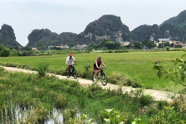 Mua Cave Tam Coc Hoa Lu Private Day Tour: Boat, Cycle & Local Family Visit photo 2