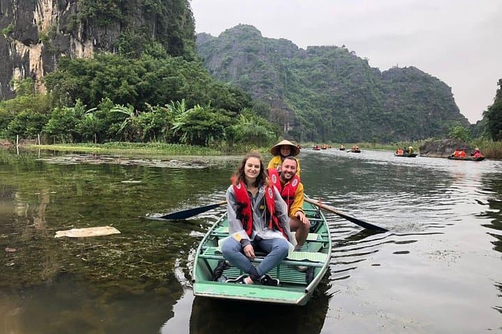 Tam Coc & Hoa Lu Private Day Tour: Sampan Boat Ride, Countryside Biking & Local Family Visit photo 3