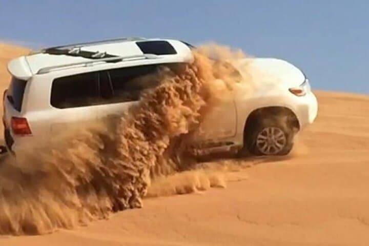 Sunset Dunes: Abu Dhabi Evening Desert Safari Adventure photo 4