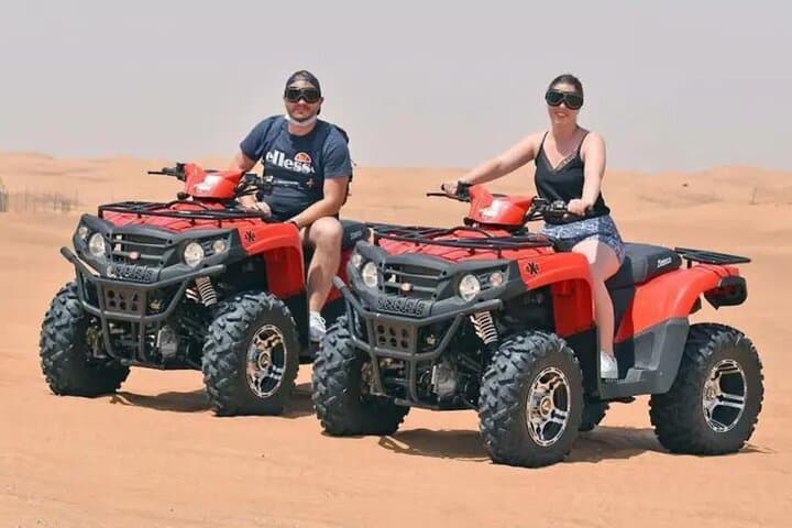 VIP Dubai Desert Safari with ATV, Camel Ride & BBQ — Red Dunes Adventure photo 1