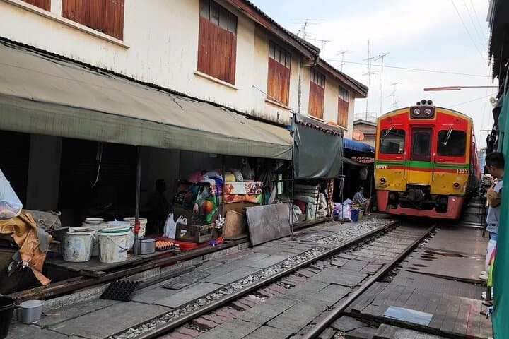 From Bangkok to Hua Hin: Maeklong Railway & Damnoen Saduak Floating Market Day Tour photo 2