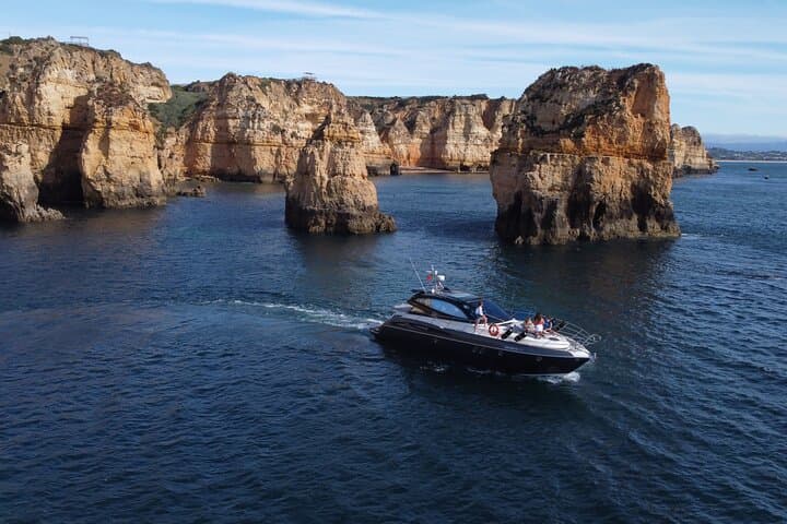 Private Half-Day Yacht Charter in Lagos — Benagil, Ponta da Piedade & Swim Stops photo 2