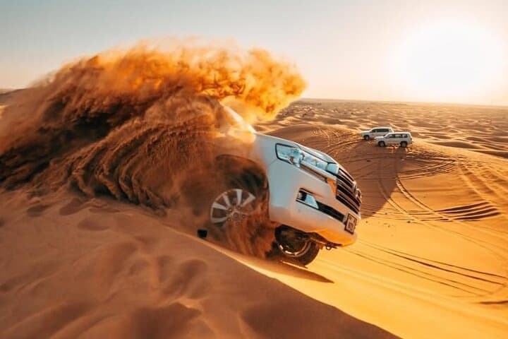 Dubai Evening Desert Safari: Dune Bashing, BBQ Dinner & Live Shows