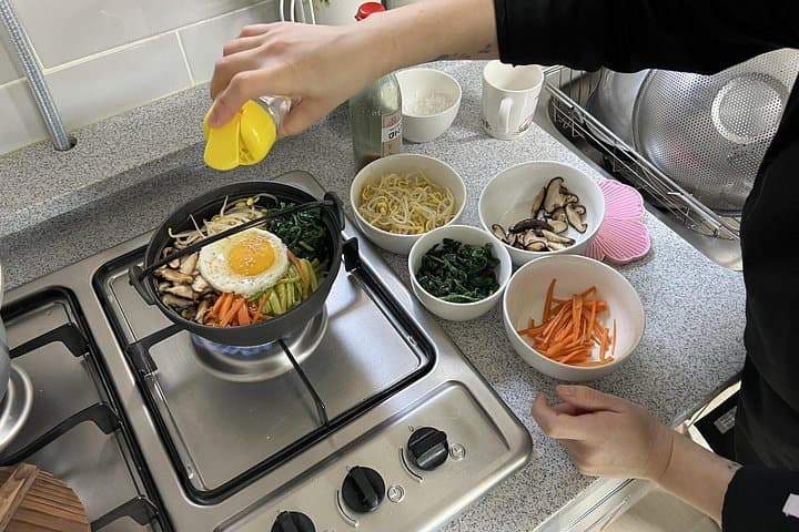 Private Home Korean Cooking Class in Seoul — Bibimbap, Kimchi & Market Tour photo 2