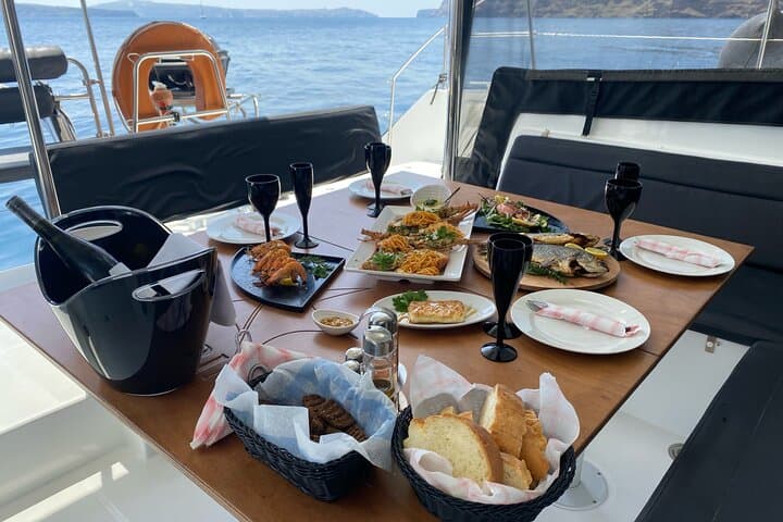 Half-Day Private Catamaran Cruise Around Santorini's Caldera photo 6