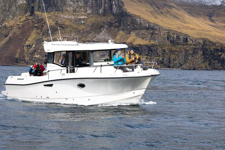 Vágar Private Boat Tour to Drangarnir, Múlafossur & Tindhólmur photo 3
