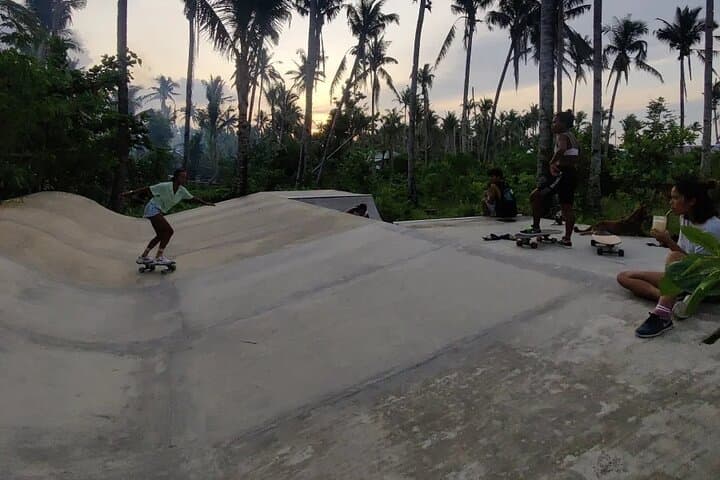 Siargao Morning Electric Skate Tour — Catangnan Bridge Ride & Beach Swim photo 3