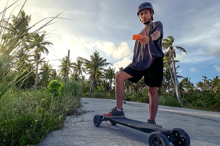 Siargao Morning Electric Skate Tour — Catangnan Bridge Ride & Beach Swim photo 2