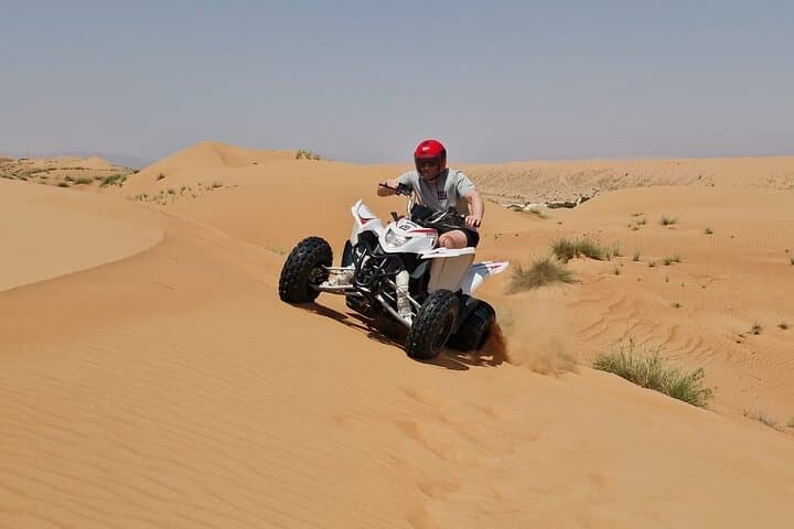Private Muscat Desert Tour — Camel Ride, Quad Biking & Sandboarding (Full Day) photo 3