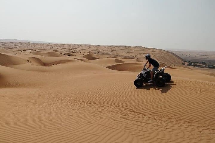 Private Muscat Desert Tour — Camel Ride, Quad Biking & Sandboarding (Full Day) photo 4
