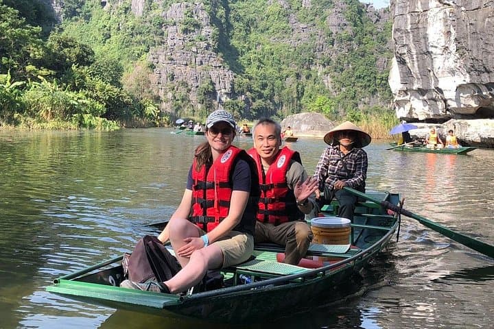 Tam Coc & Hoa Lu Private Day Tour: Sampan Boat Ride, Countryside Biking & Local Family Visit photo 4