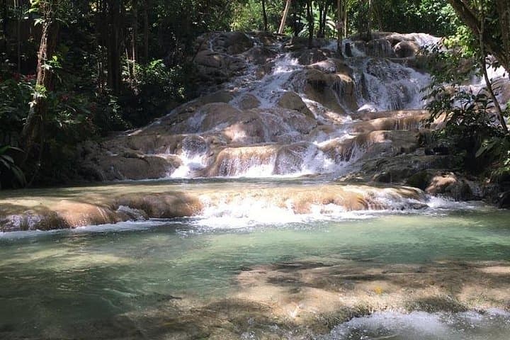 Falmouth to Nine Mile & Dunn's River Falls: Bob Marley Birthplace and Waterfall Climb photo 1