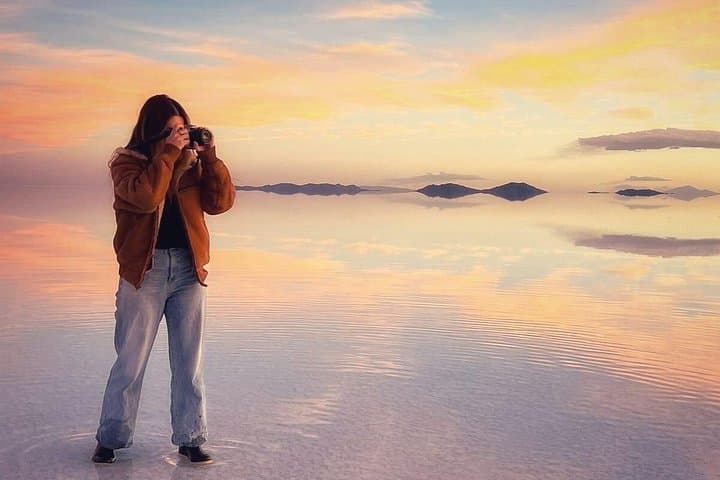 Overnight Bus to Salar de Uyuni from La Paz: Incahuasi, Train Cemetery & Sunset Reflections photo 1