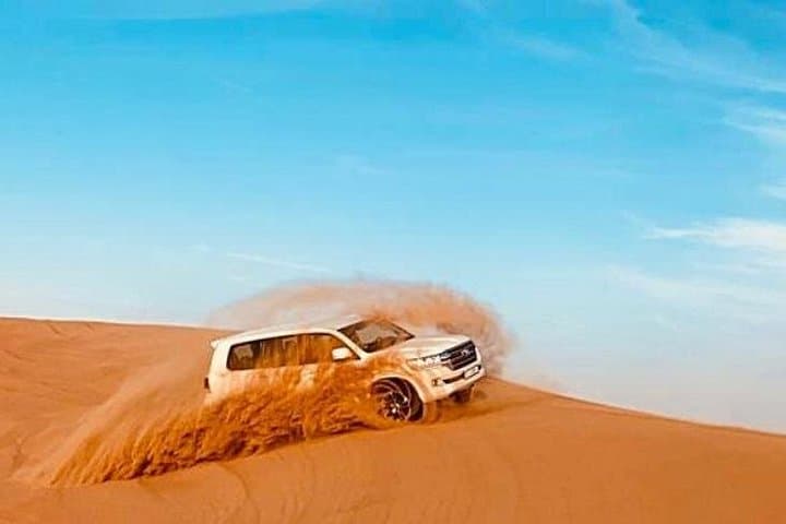 Dubai Morning Desert Safari: Camel Ride, Sandboarding & Dune Bashing in Lahbab photo 2