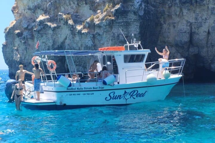 Private Half-Day Boat to Blue Lagoon & Comino: Snorkel, Caves and Coastal Views photo 2