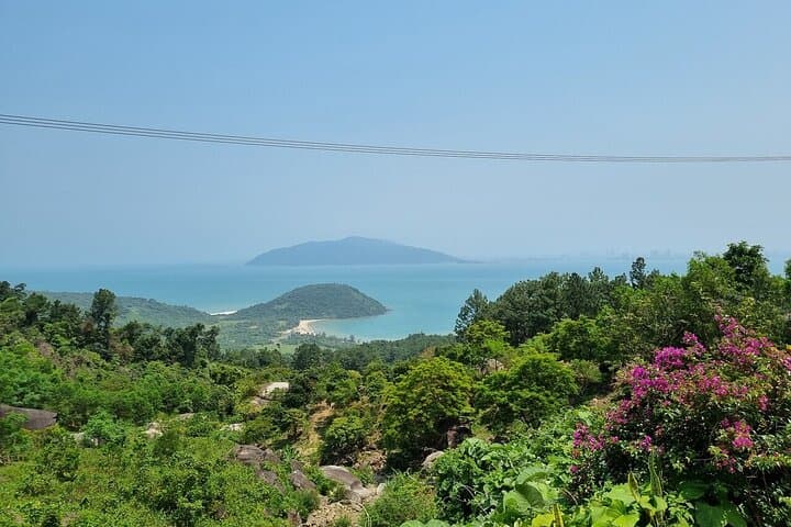 Hue to Hoi An via Hai Van Pass: Private Transfer with Marble Mountains & Lang Co Beach
