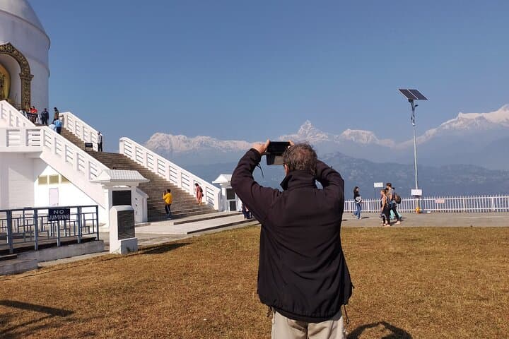 Full-Day Pokhara Local Bus Sightseeing: Phewa Lake, Caves & Peace Stupa photo 2