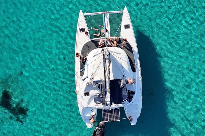 Sunlit Catamaran Cruise from Mykonos: Delos, Rhenia & Water Toys photo 5