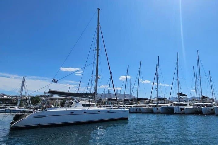 Mykonos Private Catamaran Cruise to Delos and Rhenia: Swim, Snorkel & Ancient Ruins photo 1