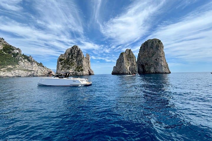 Naples to Capri Private Pardo 43 Boat Tour — Blue Grotto, Faraglioni & Swim Stops photo 1